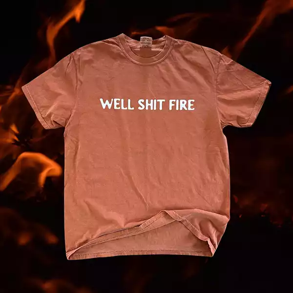 orange shirt with white text