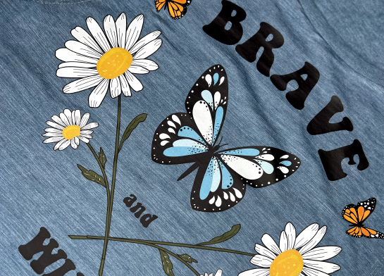 butterflies and flowers on a blue shirt